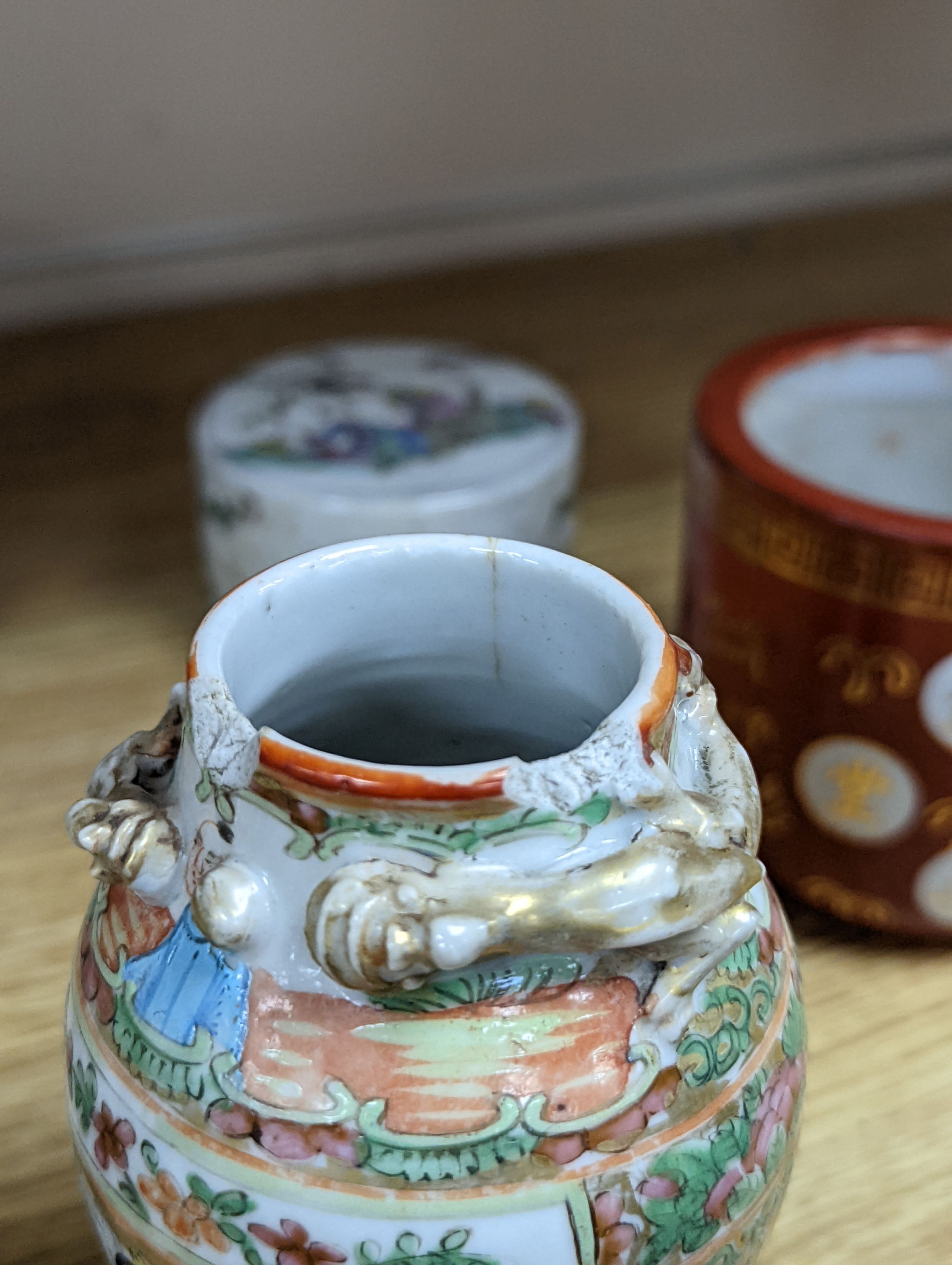 A group of Chinese famille rose vases and jars, a box and cover and a teapot, 19th/20th century, Pair of vases 13 cms high.